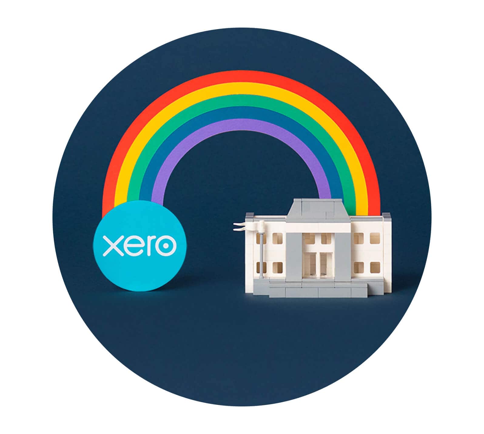 A rainbow connects an accountant working at a laptop with the tax authority via Xero.
