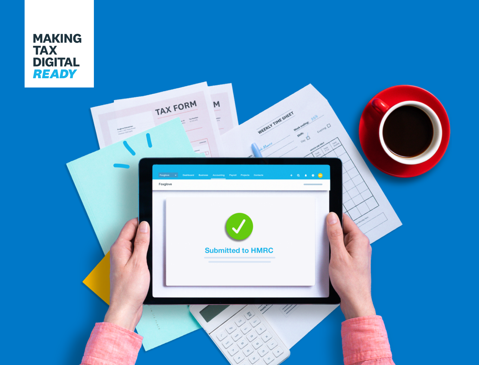 Hands typing on laptop running Making Tax Digital software in office setting