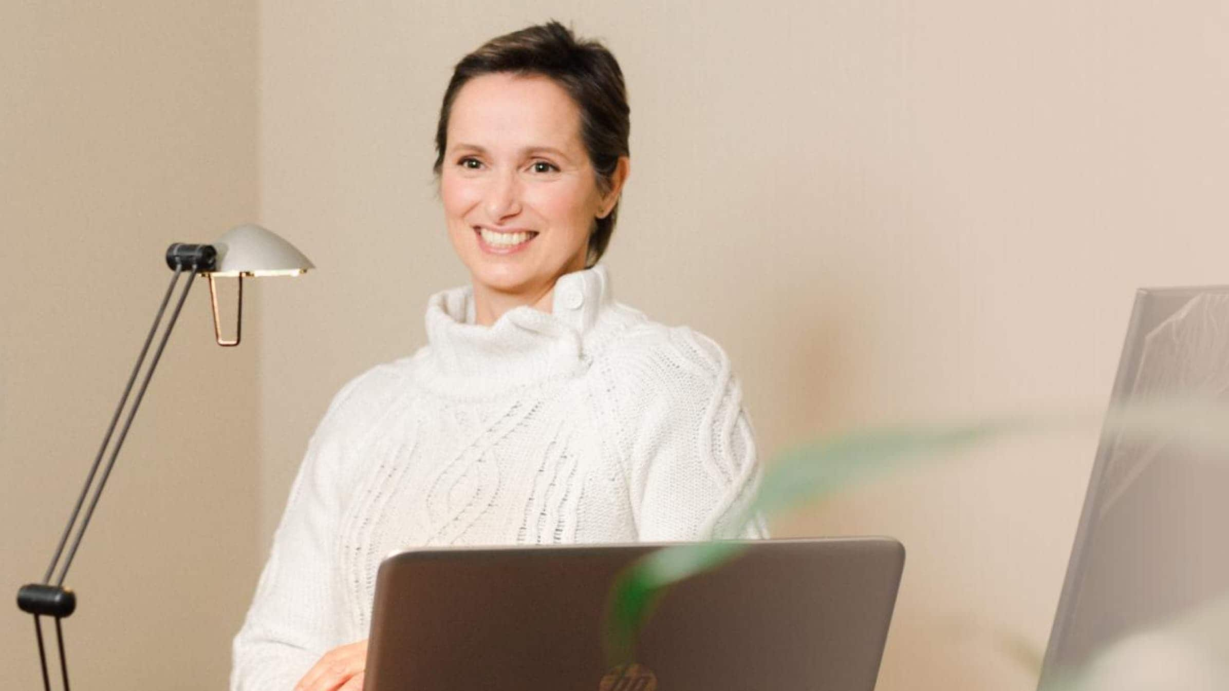 Hayley Haughton, bookkeeper at Cloudmeb, sitting at her computer.