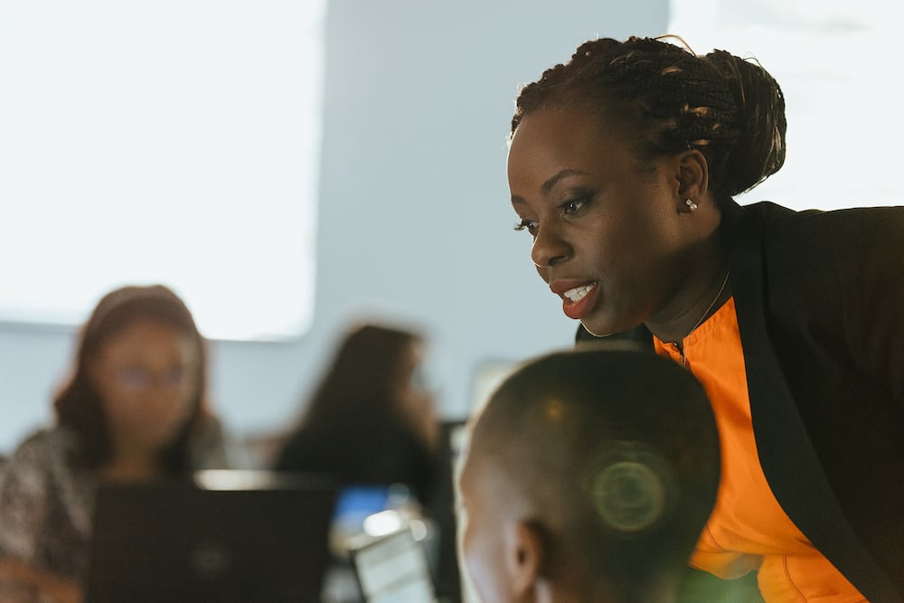 A teacher using Xero’s cloud-based accounting software to train students.