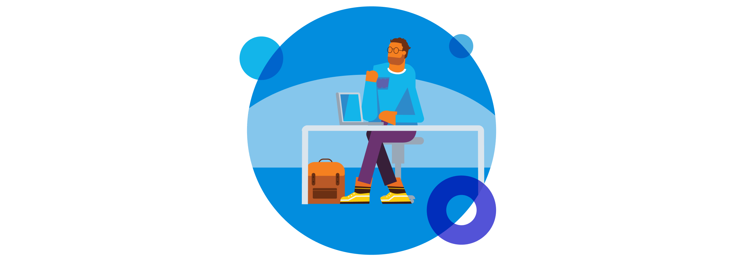 A graduate security analyst sits at their desk with an open laptop familiarising themself with Xero’s security framework.