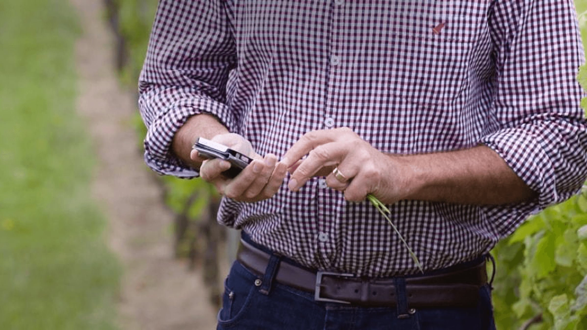 A journalist checks their mobile phone for details of media contacts at Xero. 