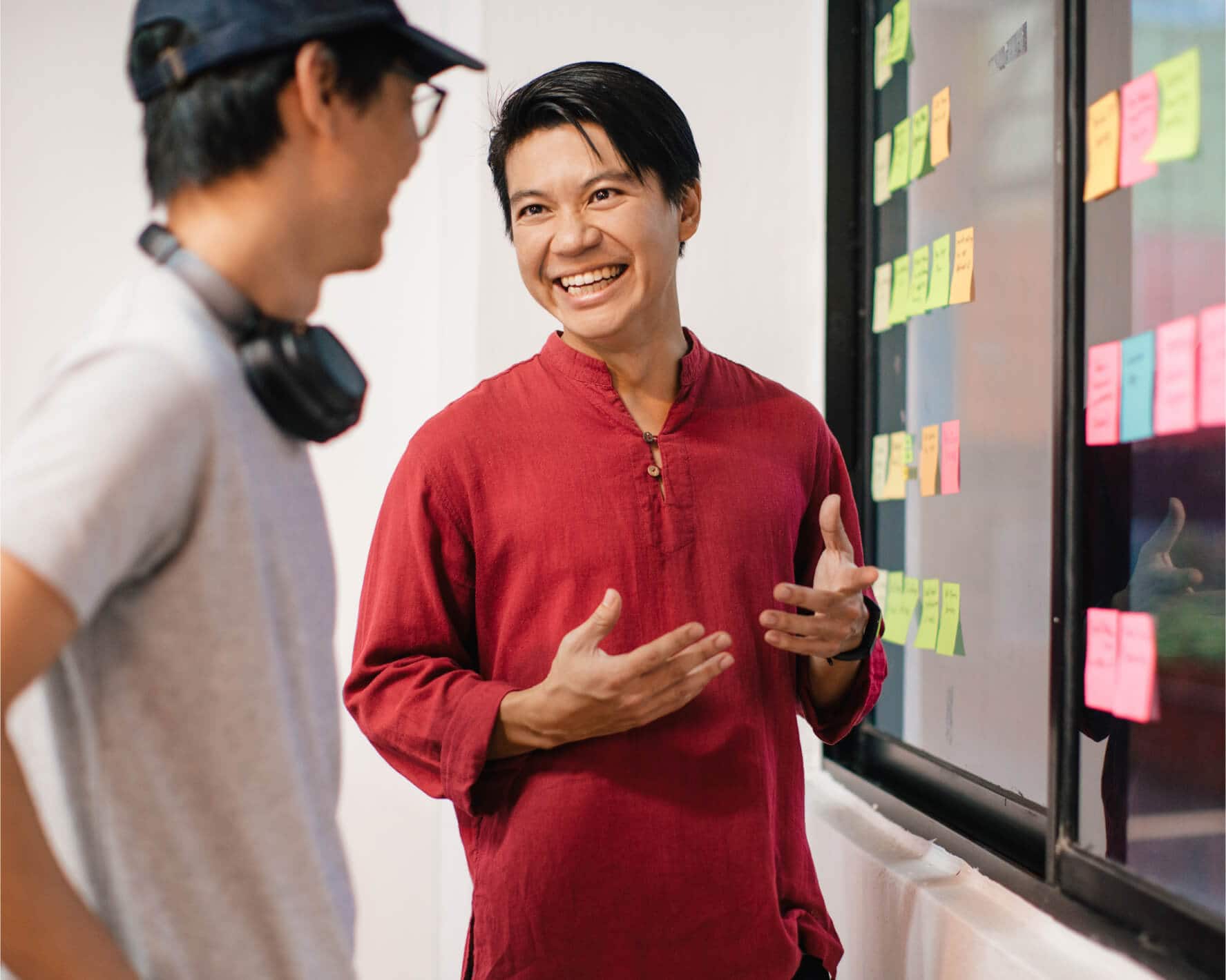 A startup owner using Xero talking to a colleague