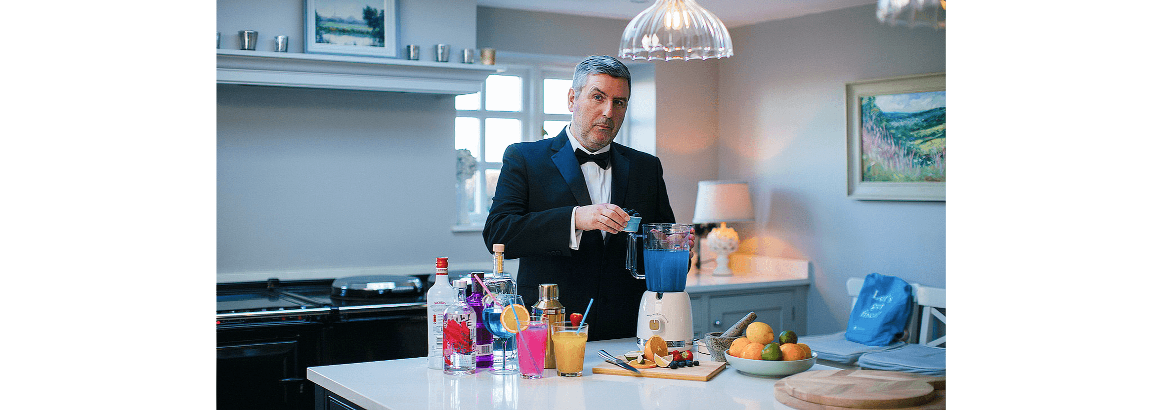 Gary Turner, Managing Director, UK and EMEA in his kitchen making  cocktails.