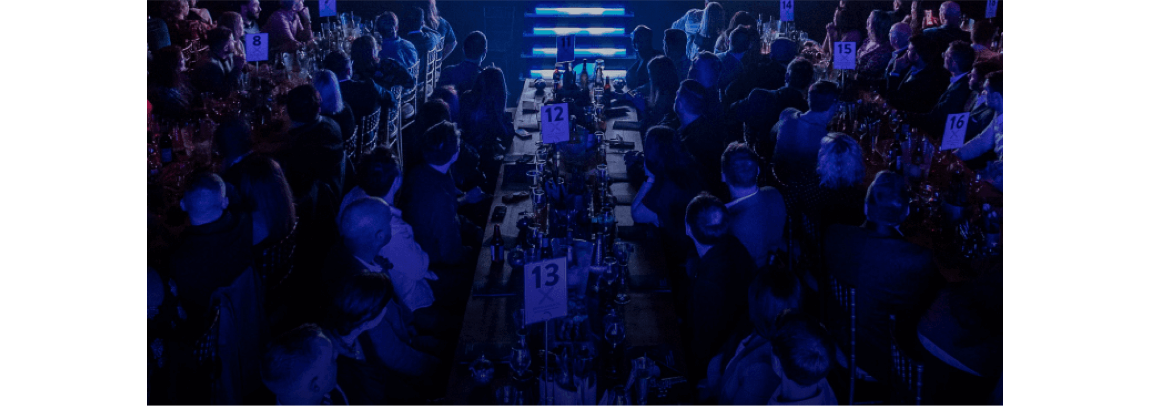 Finalists at the Xero Awards celebration listen to the winners being announced.