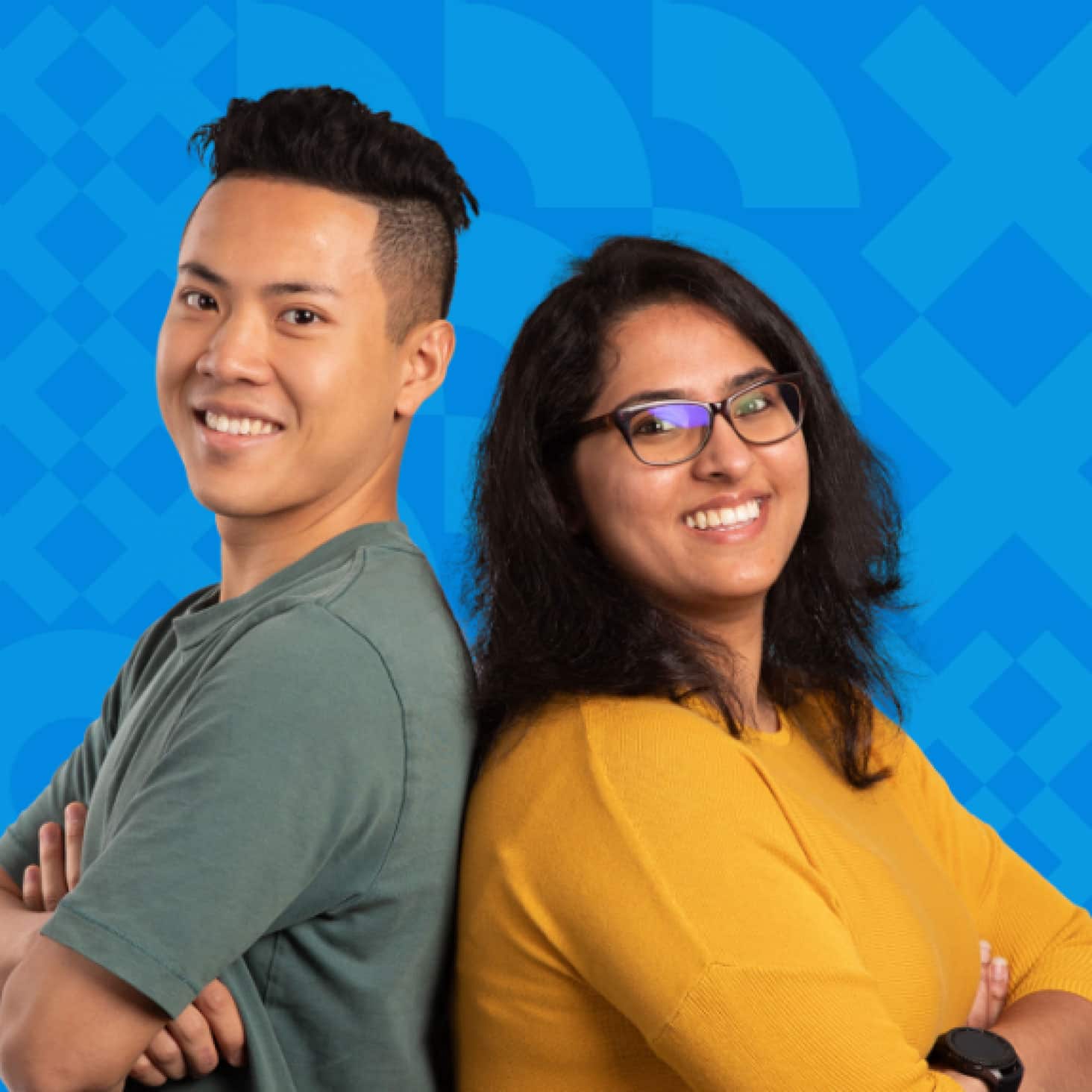 Two people in front of a Xero branded background