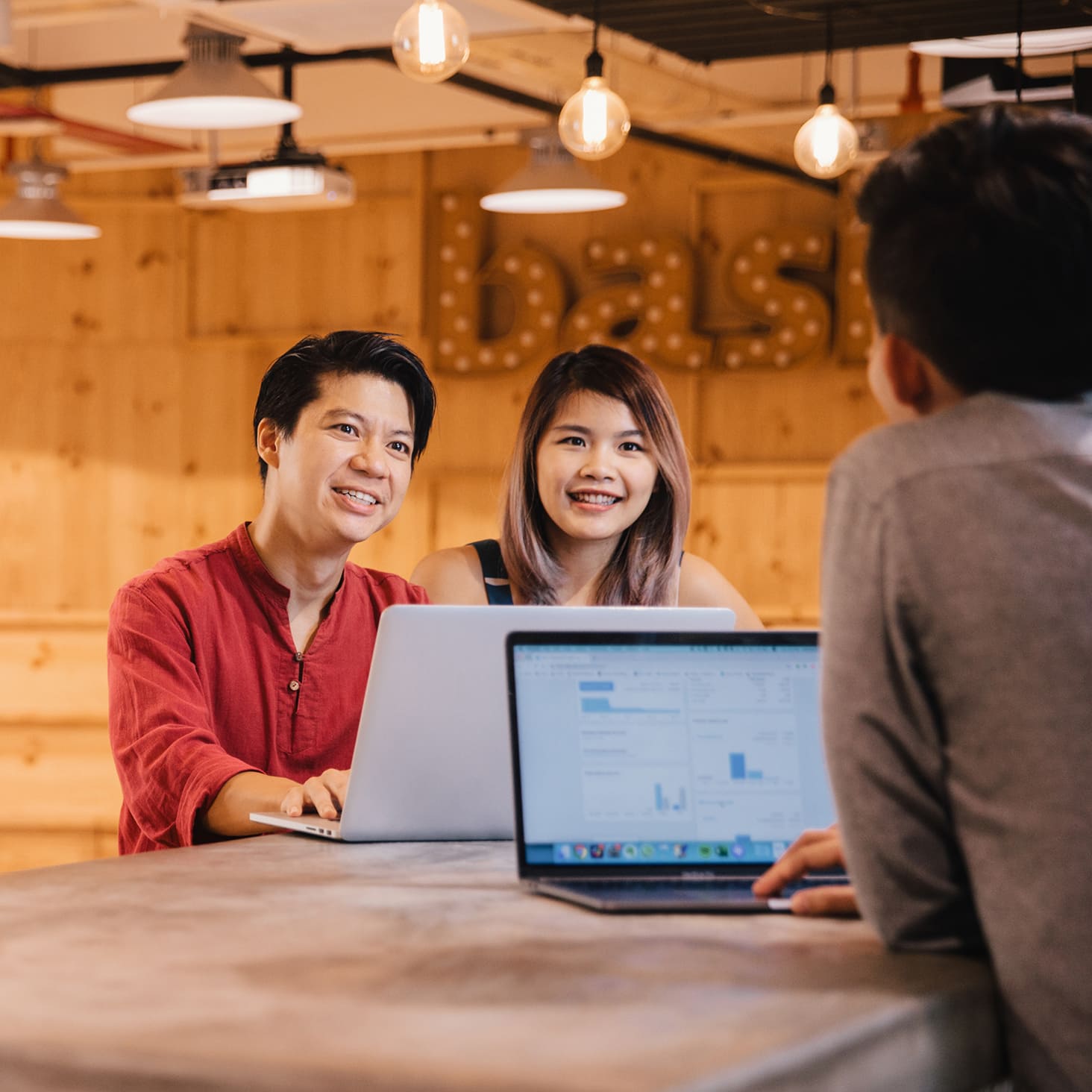 Small business partners chat with their accountant about transferring existing transactions into Xero. 