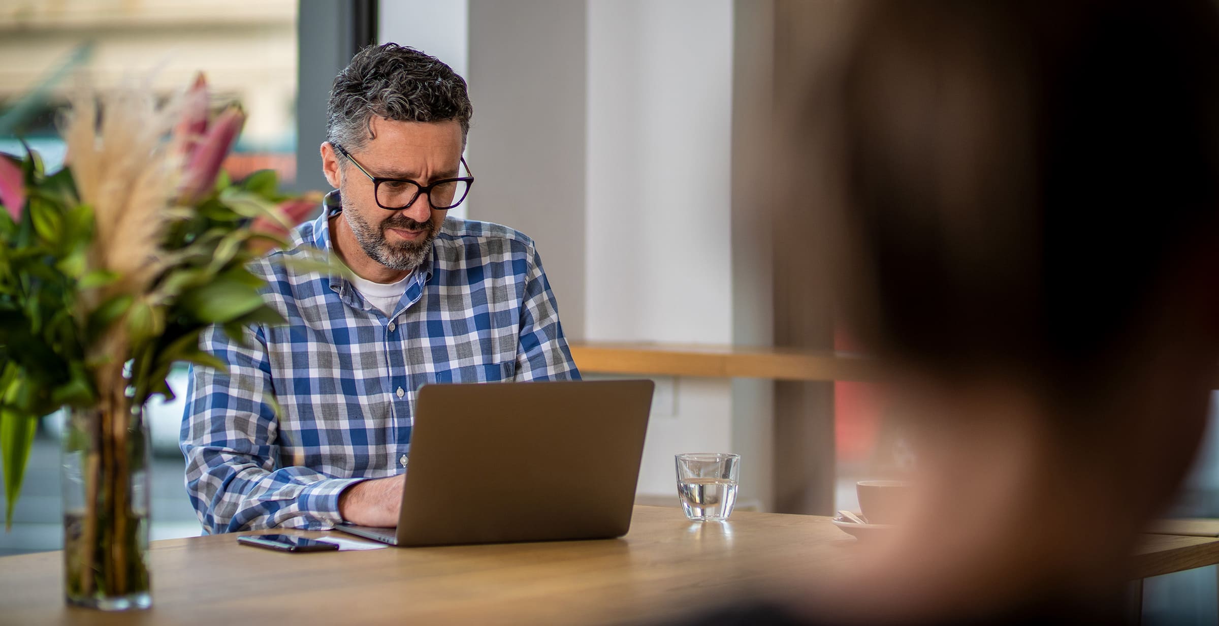 A person using a laptop.