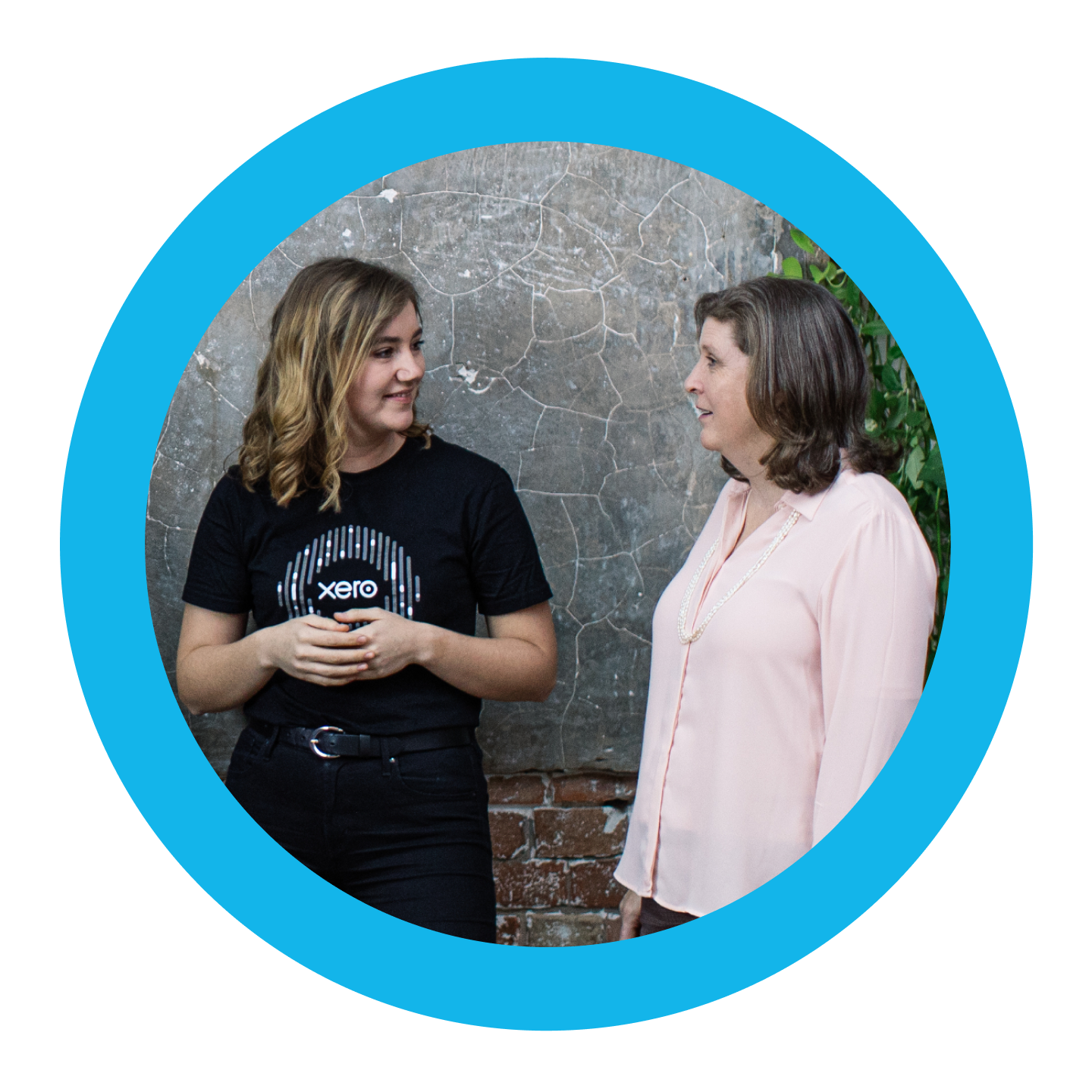 A person speaks to a Xero staff member