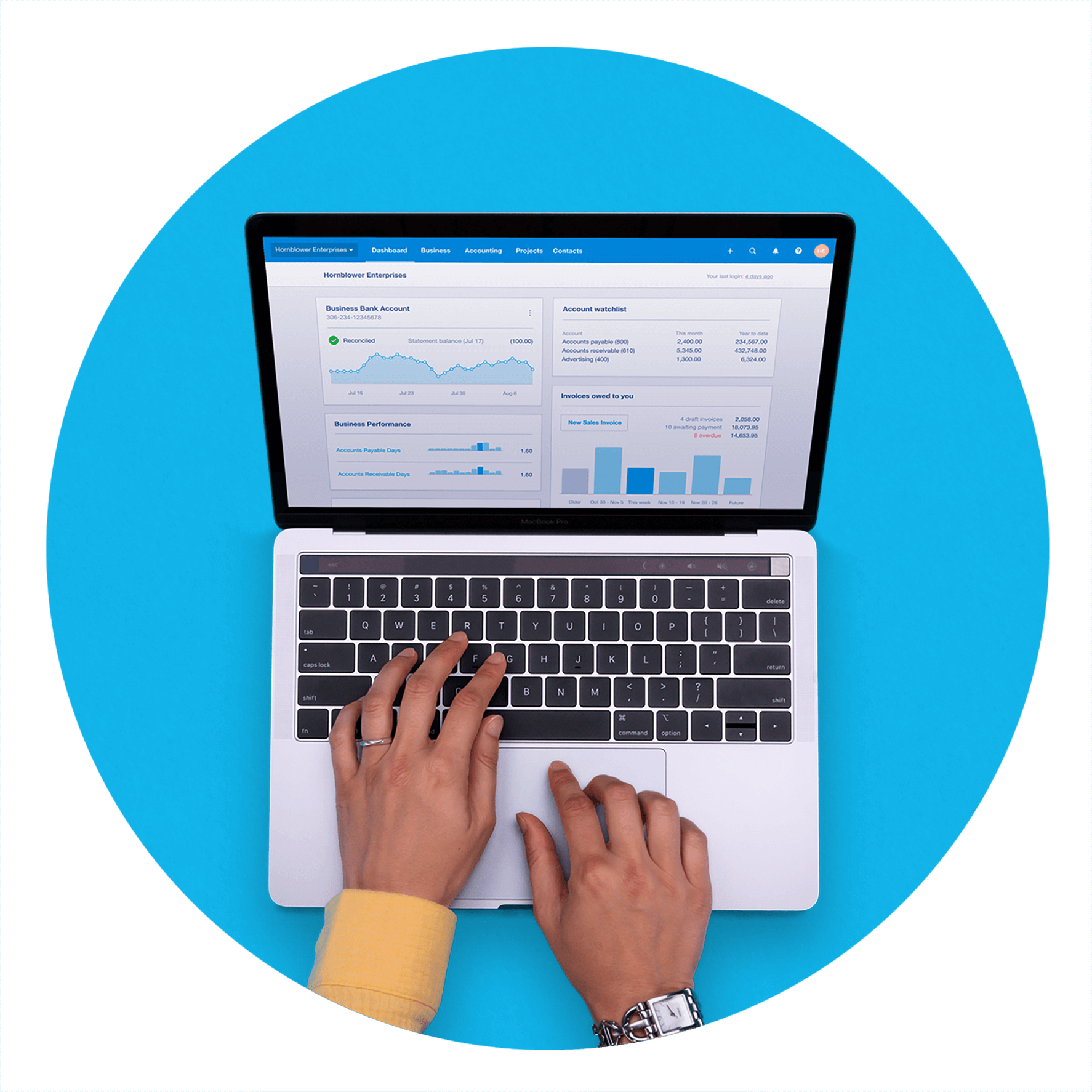 A person is looking at the Xero dashboard on a laptop