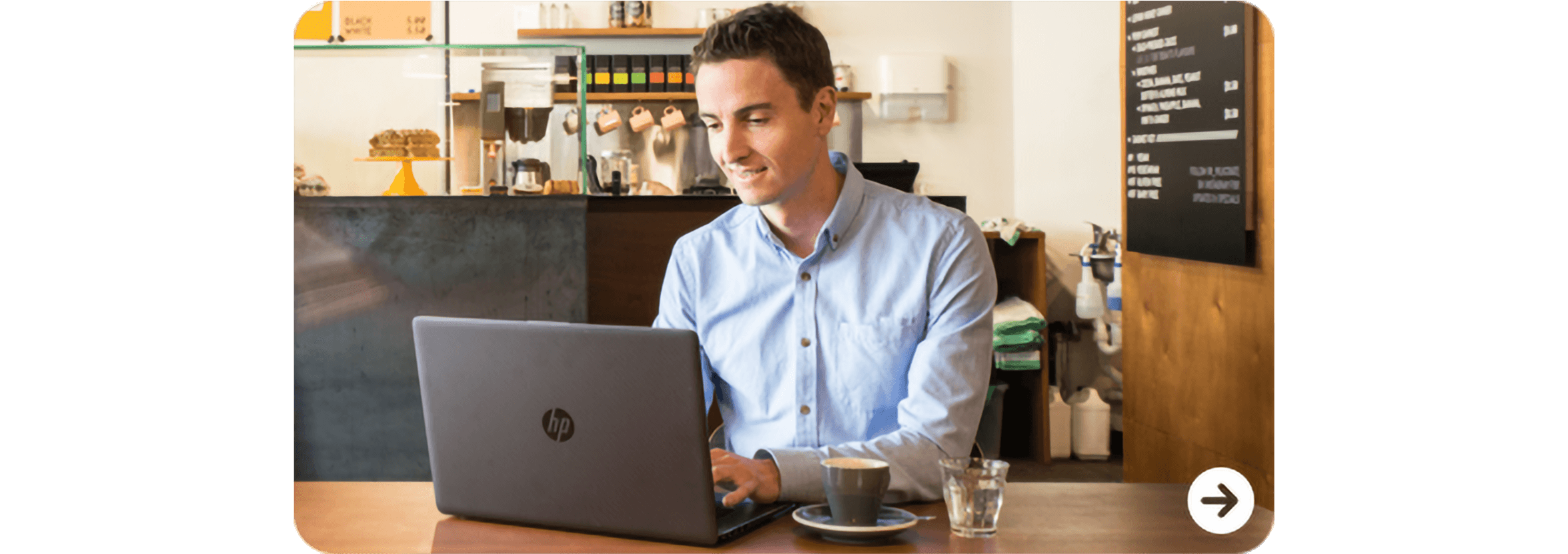 A cafe owner uses Xero on a laptop to keep the accounts up to date.