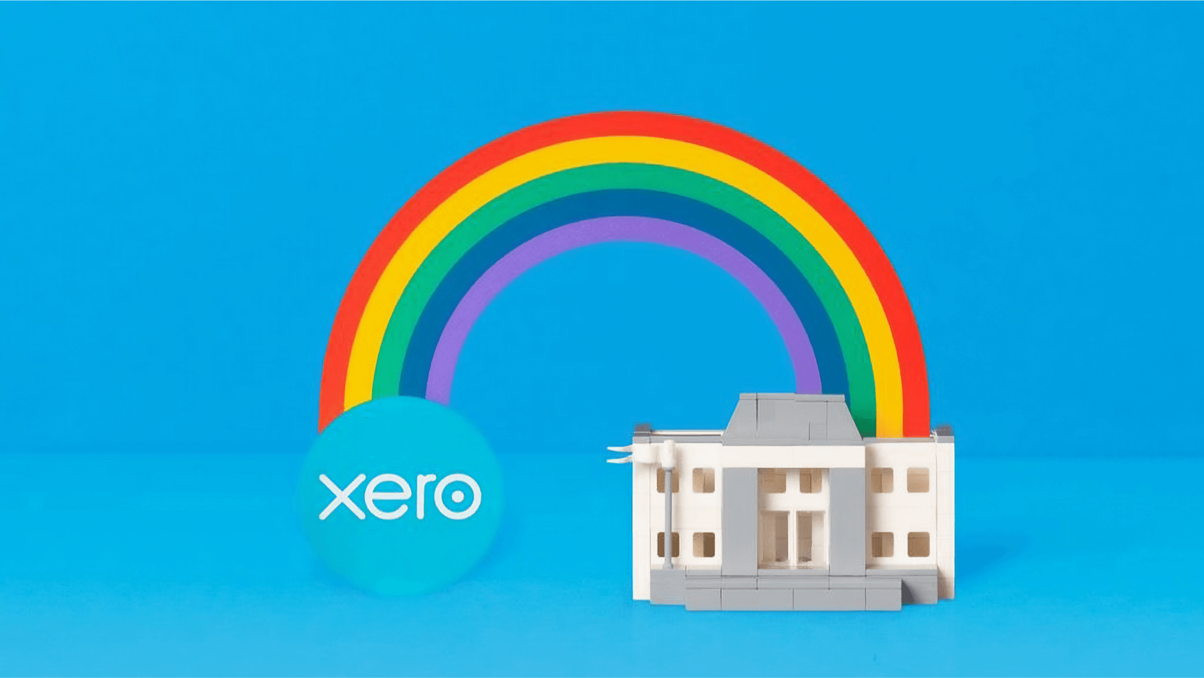 A rainbow connects a small business owner at their workplace with Xero’s cloud-based accounting software.