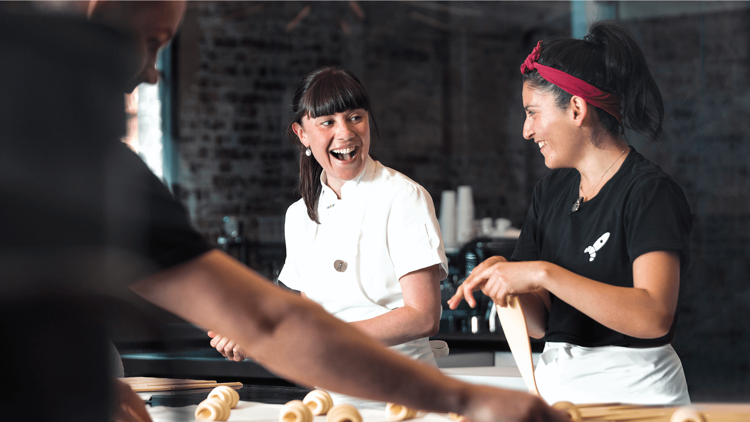 Kate Reid from Lune Crossanterie in Melbourne at work making croissants with one of their staff.