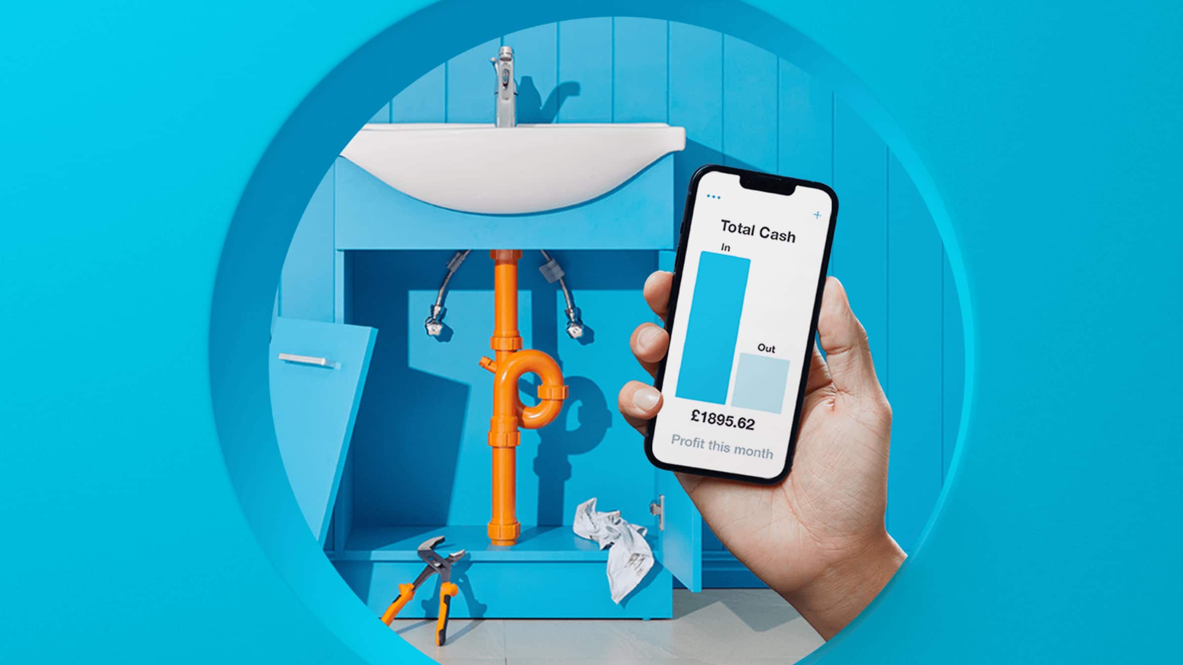 Xero blue sink with orange water pipes. Hand in front holding a phone device with cashflow dashboard.