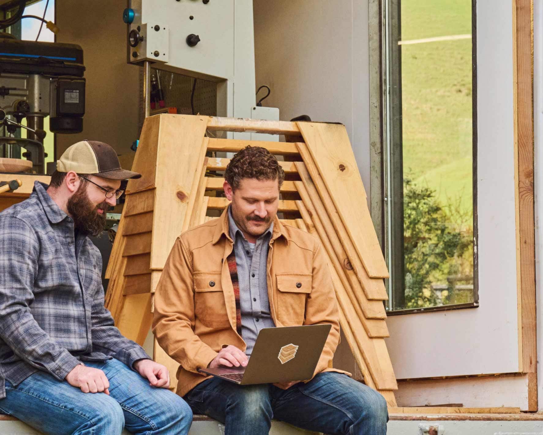 placeholderTwo men sitting together on a laptop