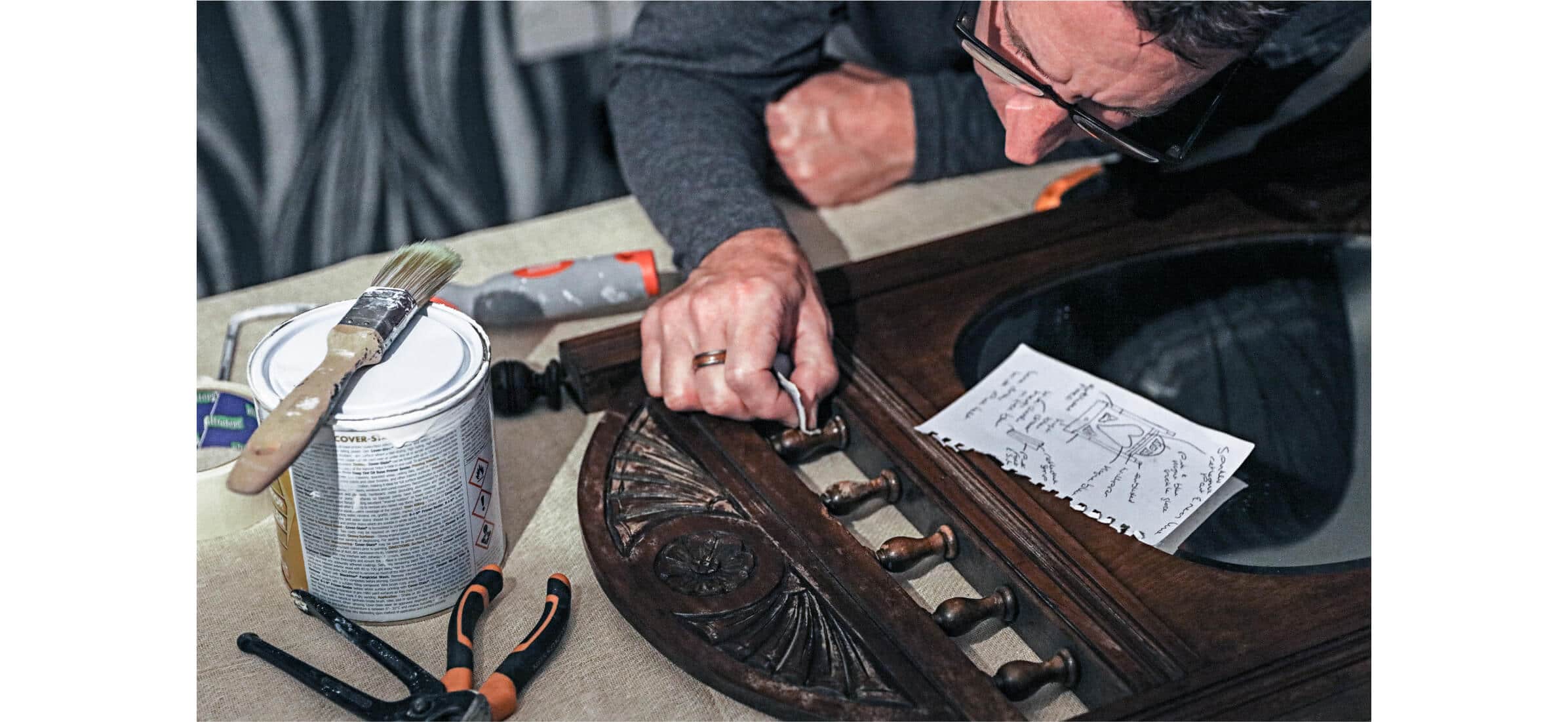 Paul Walden working on restoration of old wooden furniture.