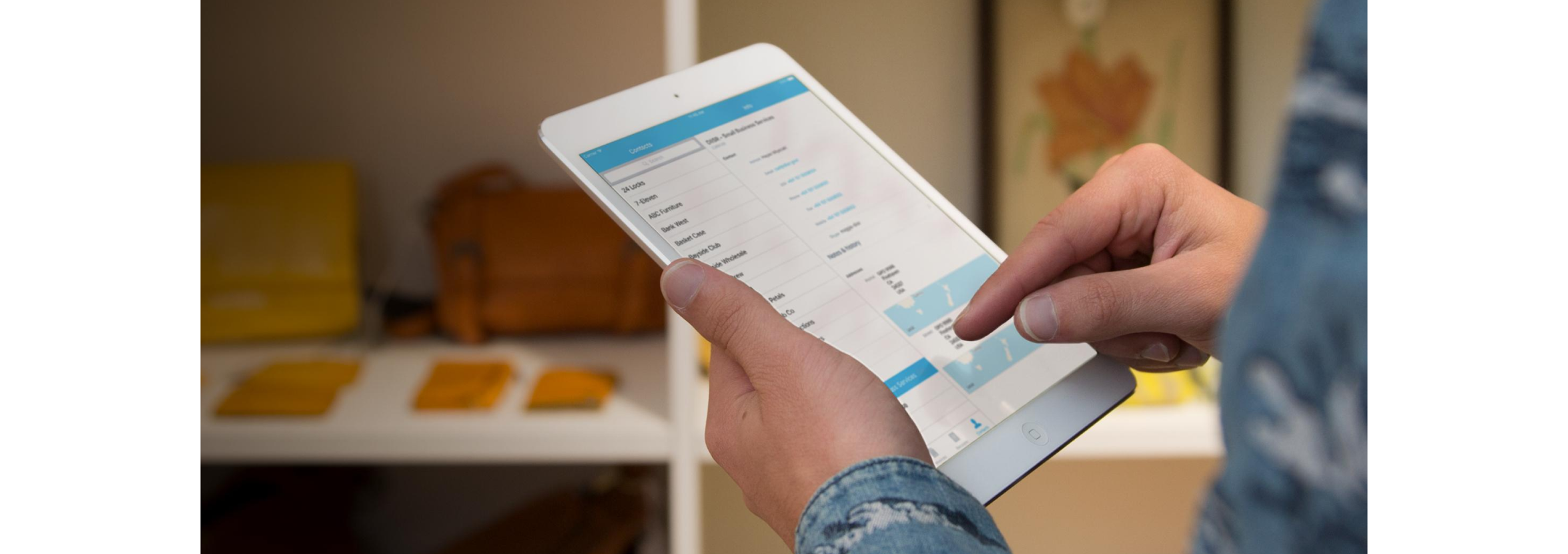 The screen of a mobile device showing a business owner processing a set of payments through Xero Pay with Wise.