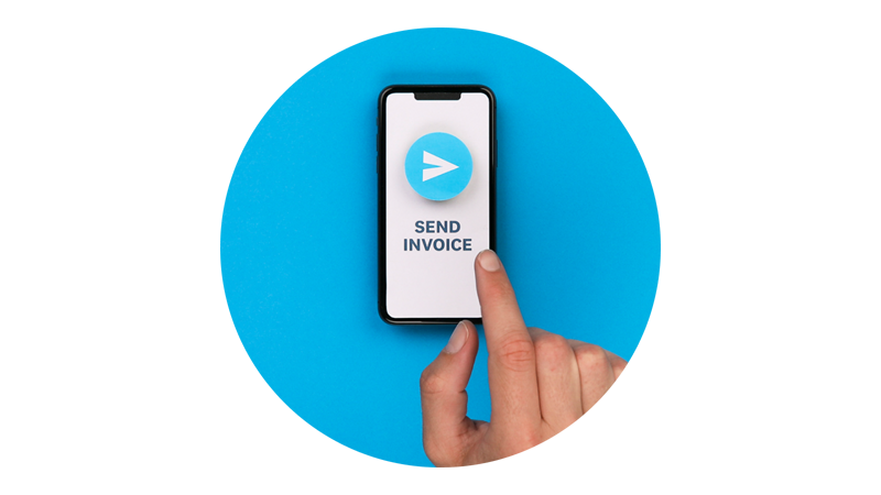 A hand pressing a send invoice button on a mobile phone