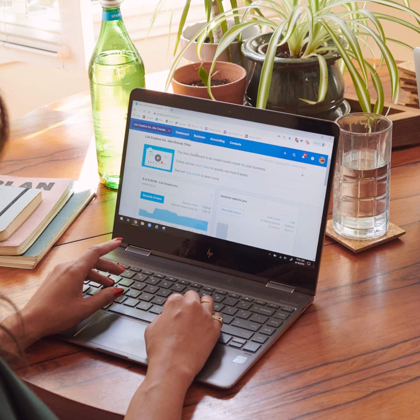 An accountant checking their client’s Xero accounts on their laptop.