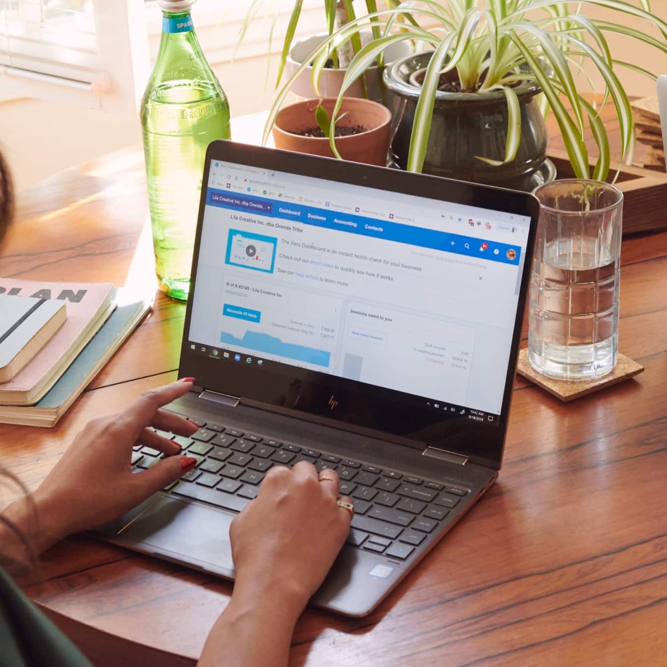 An accountant checking their client’s Xero accounts on their laptop. 
