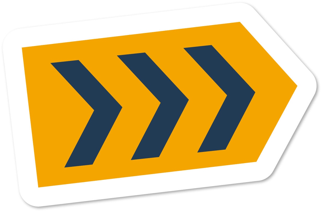 A road sign with arrows pointing to the right.