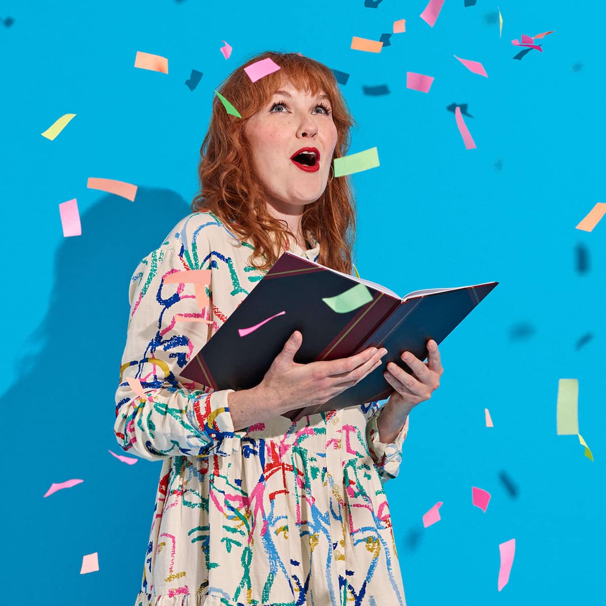 Multi-coloured confetti showers down on an awards winner.