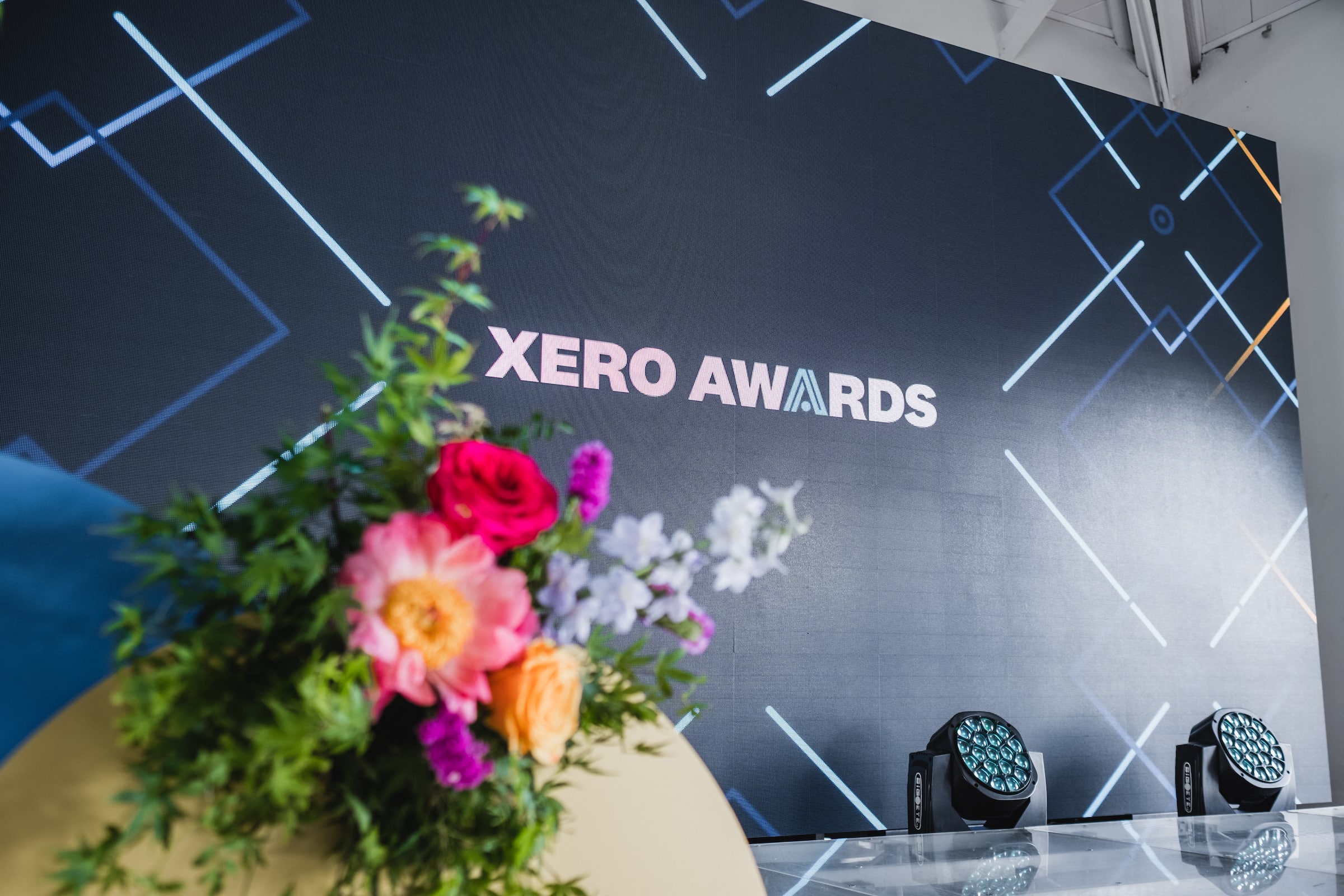 Image of Xero Awards stage with flowers