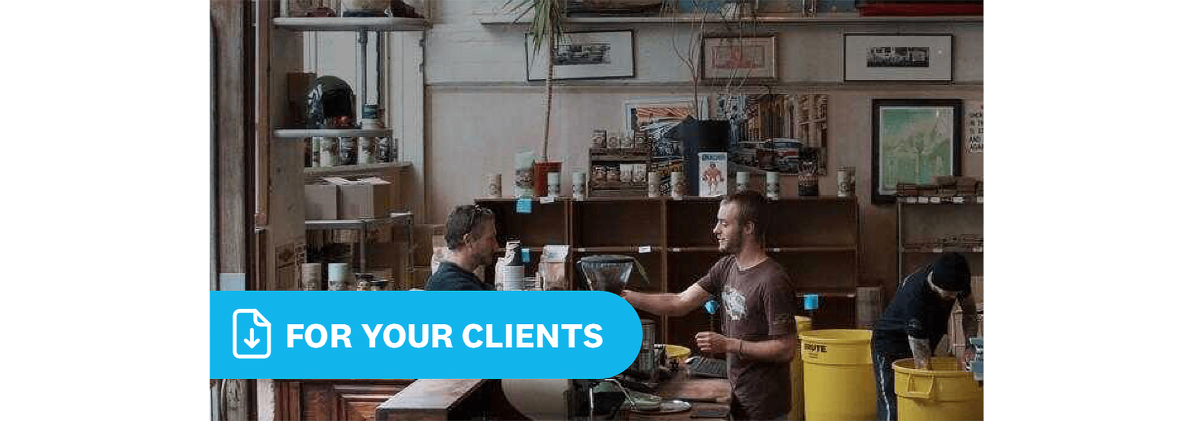 A cafe owner makes coffee for a customer.