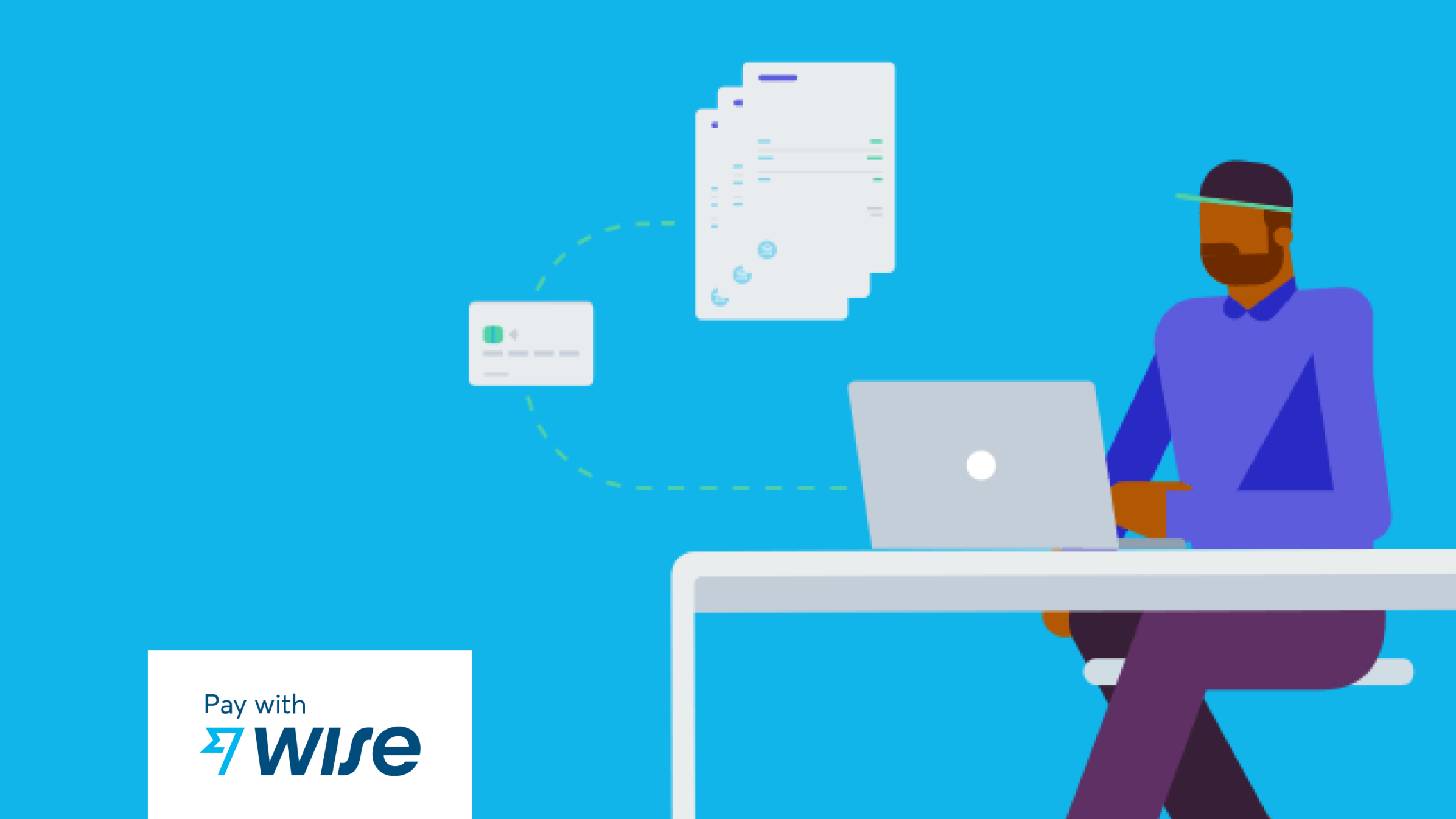 An accountant sits at their PC processing payments through Xero Pay with Wise.