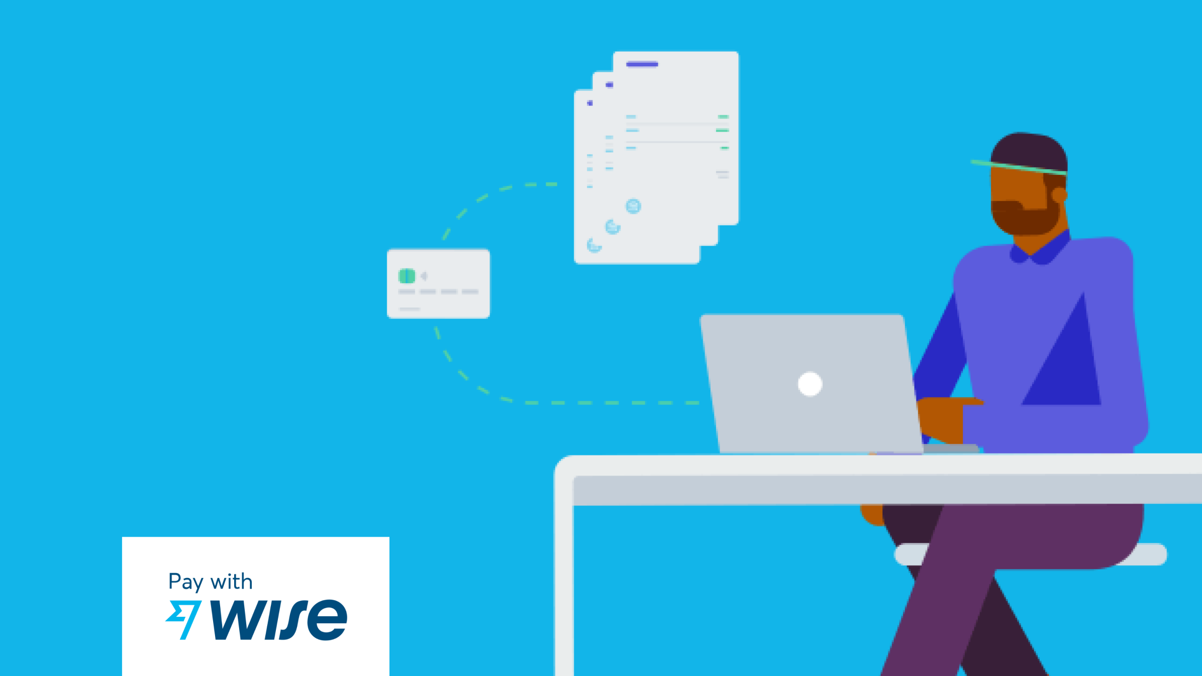 An accountant sits at their PC processing payments through Xero Pay with Wise. 