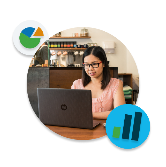 Person on laptop with graph illustrations surrounding.