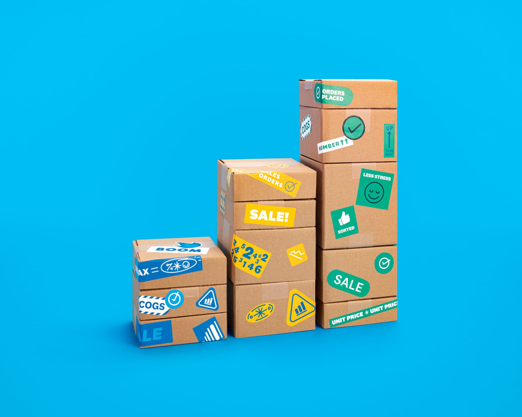 Three stacks of cardboard boxes ready for pickup and delivery to customers.