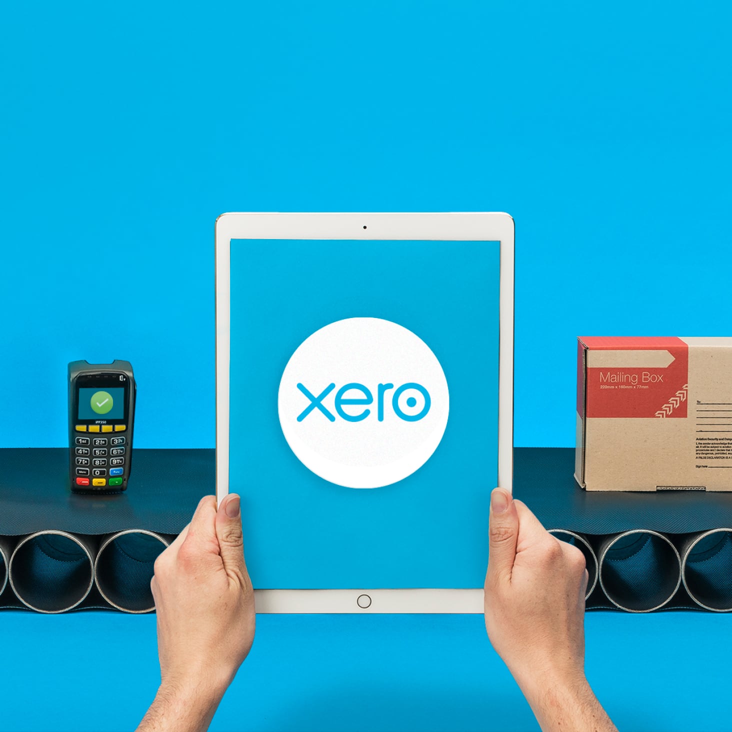 A small business owner using Xero on their tablet for tax preparation