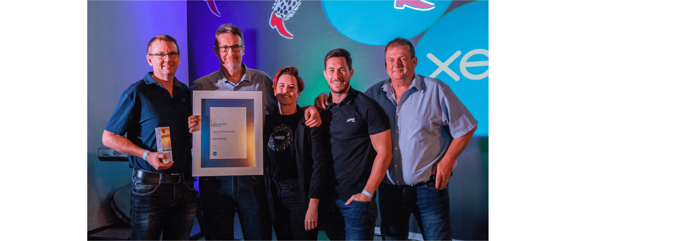 Members of the Nel & Vennote team celebrate winning the Partner of the Year award.