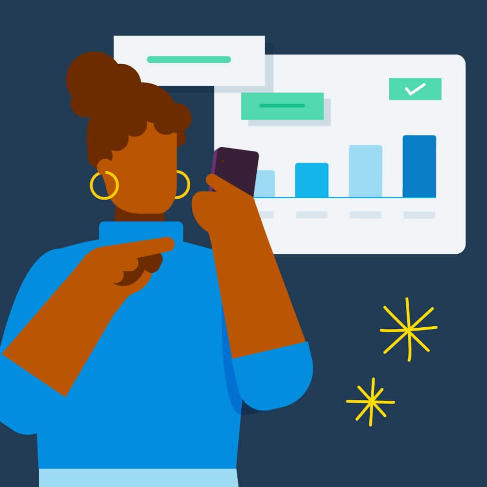 A woman looking at her phone and reading diagrams.