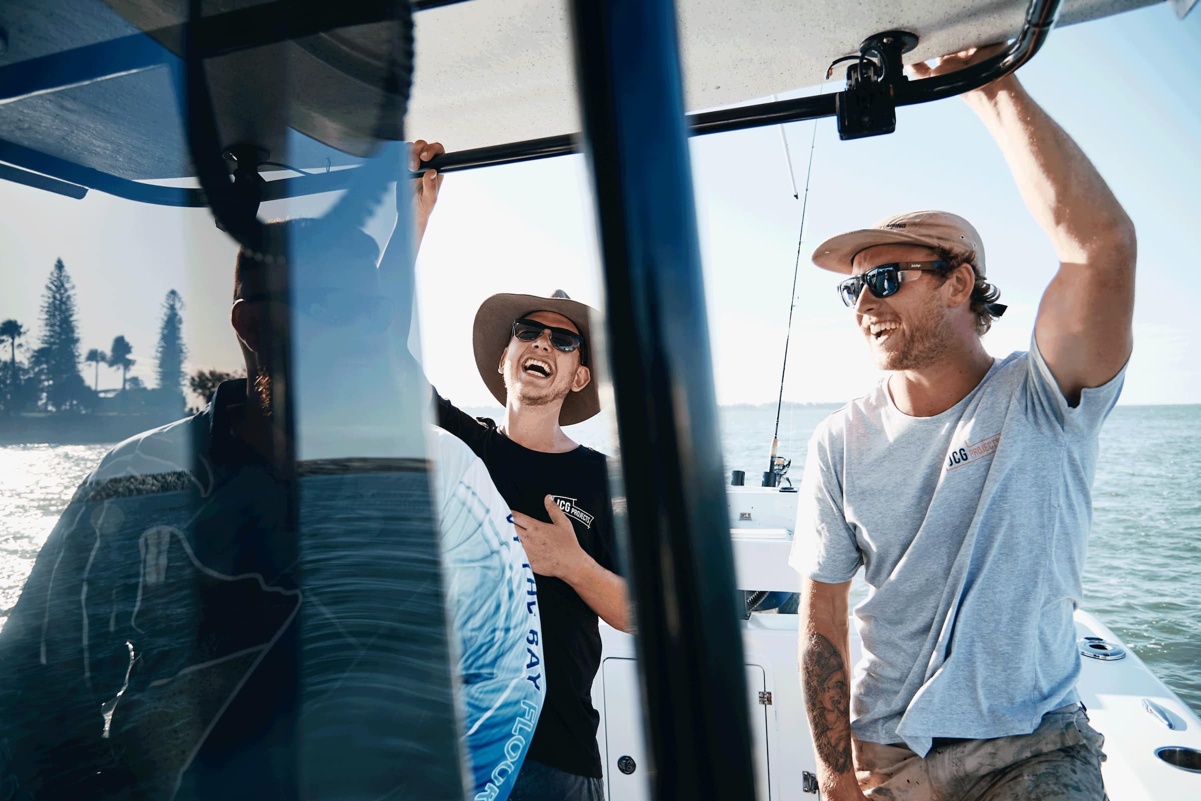 Johnno and his staff fishing on his boat