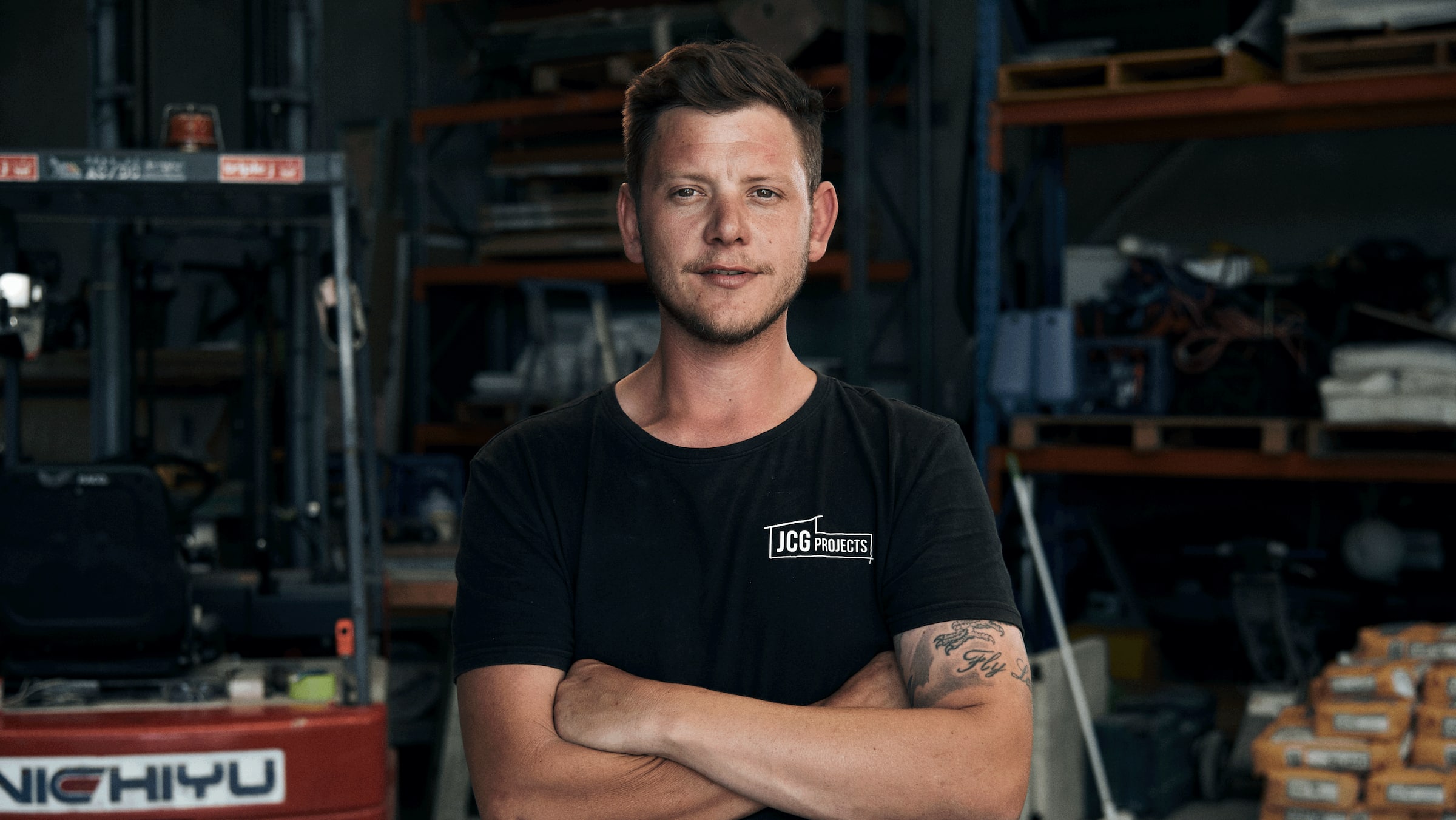 Johnno Green from JCG Projects looks at the camera while in his workshop