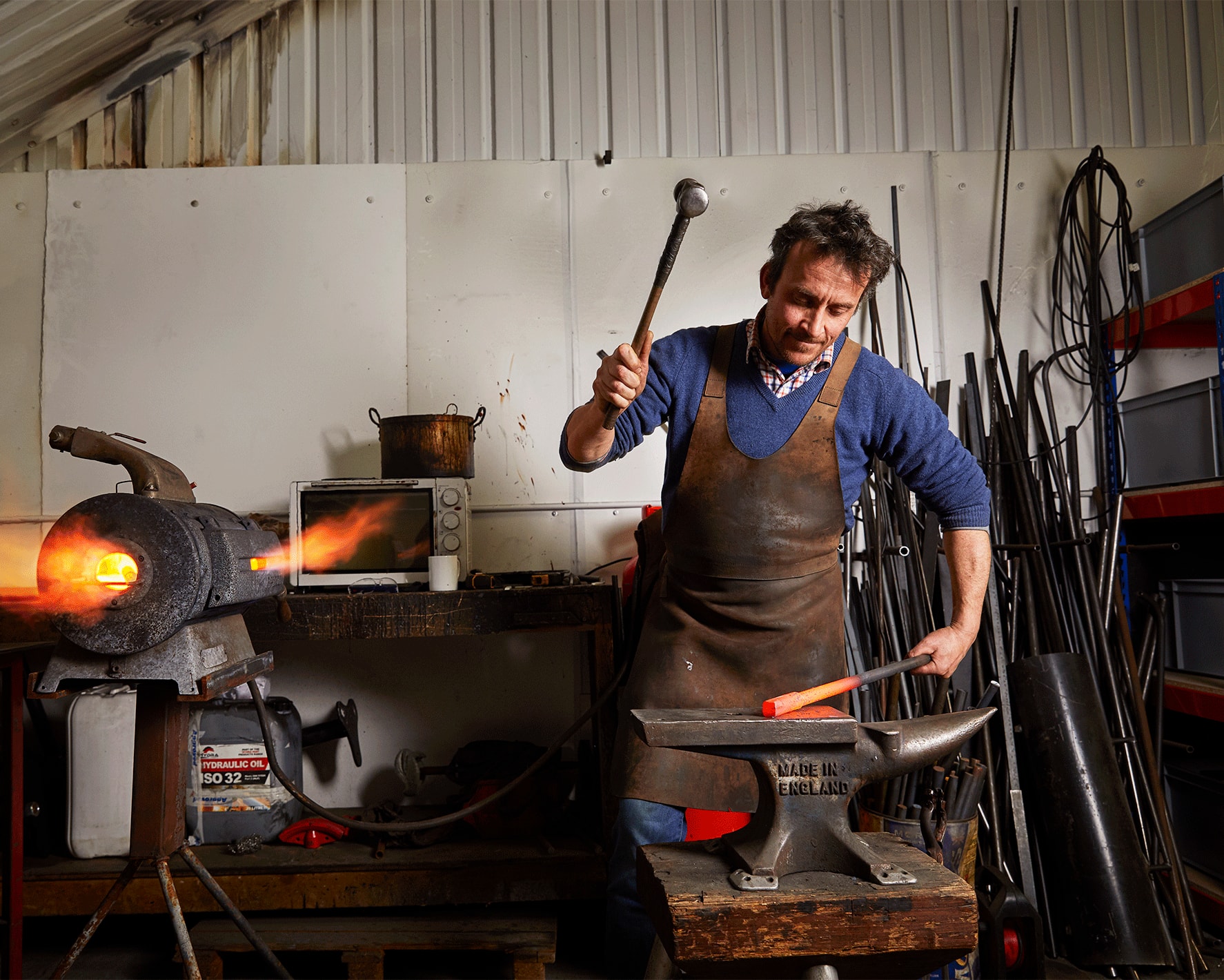 A blacksmith doing metalwork