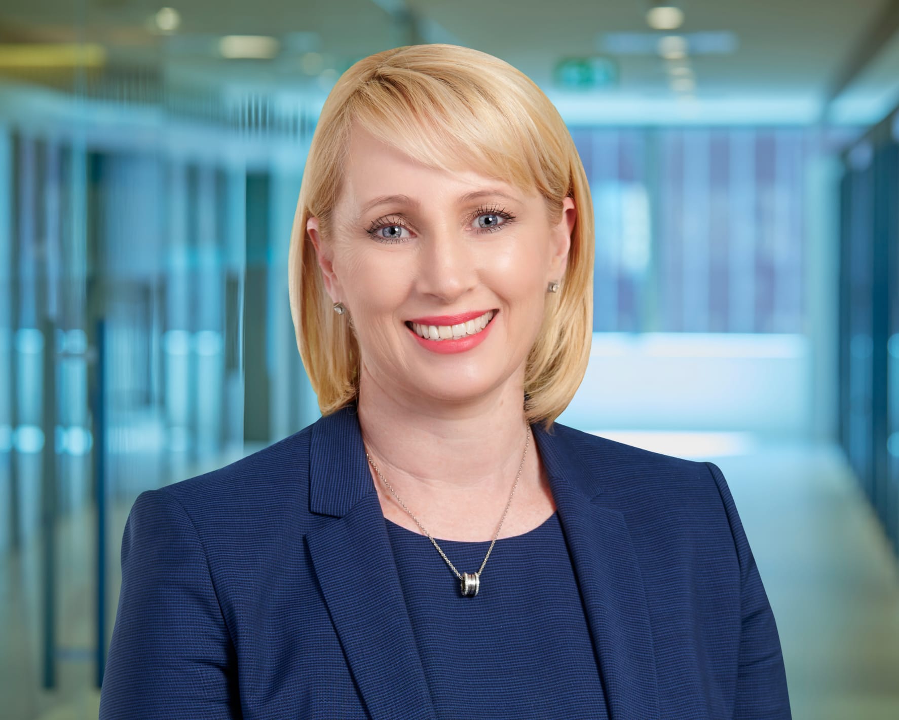 Headshot of Tanya Titman from BDO, at a modern corporate office.