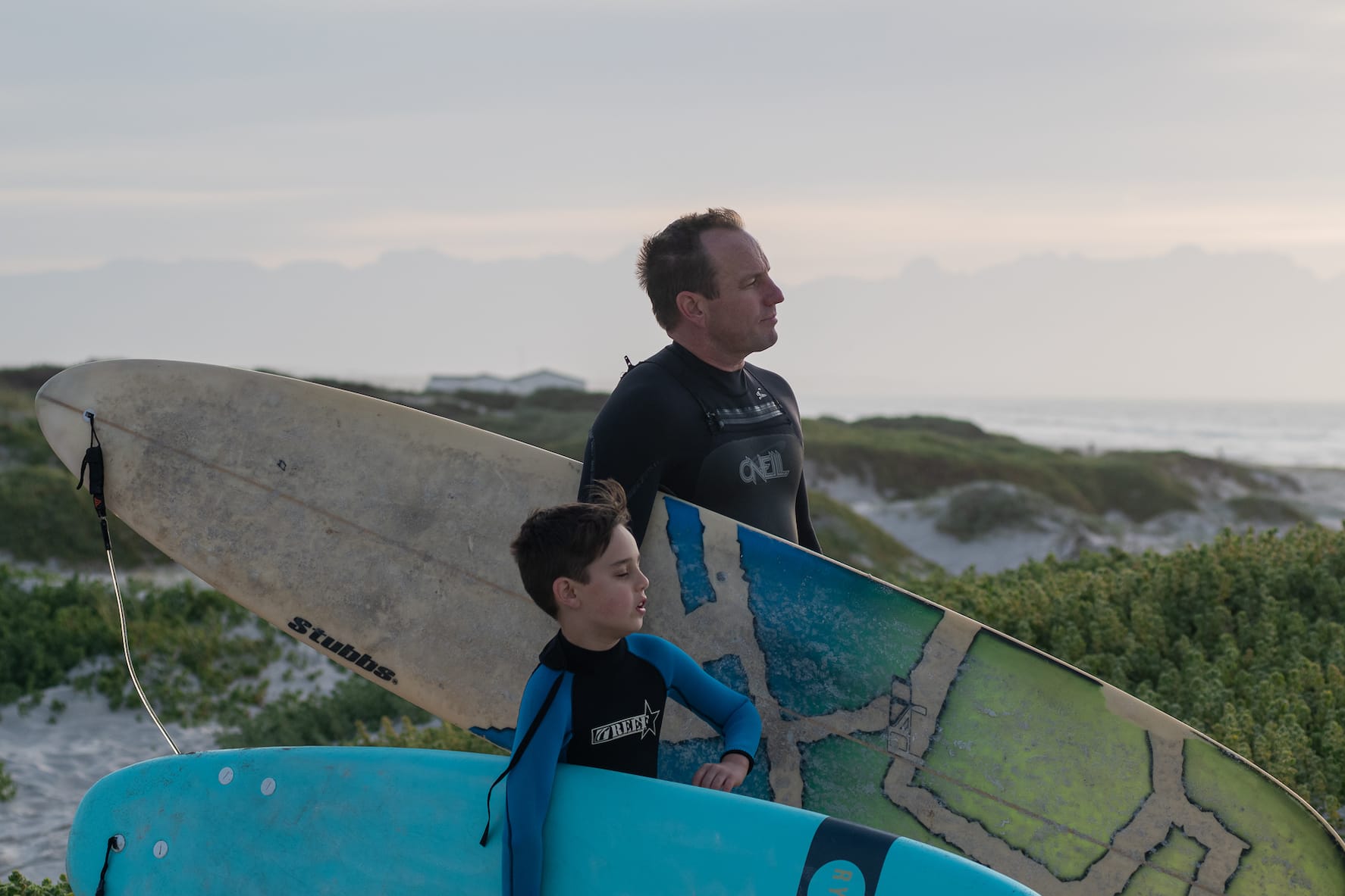 Father and son from NML preparing to surf. They use Xero accounting software.