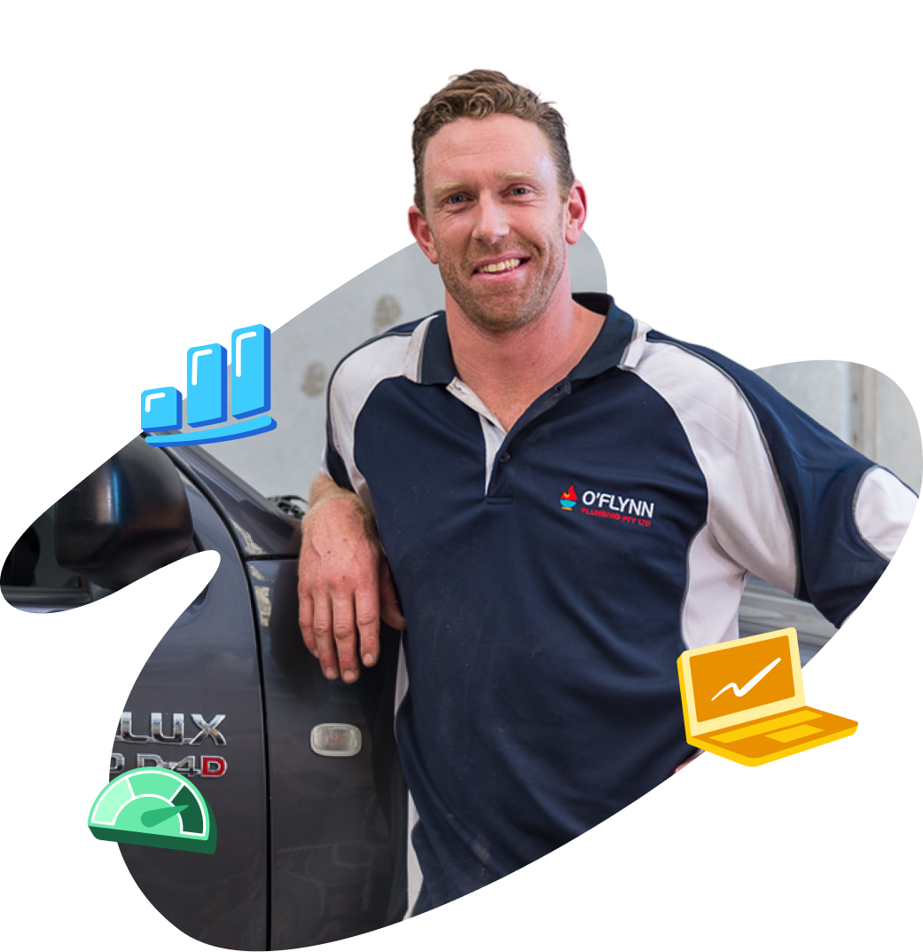 A plumber standing in front of a utility vehicle