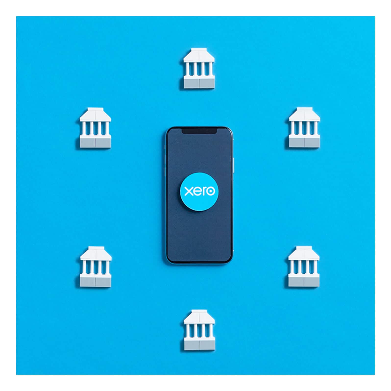 Mobile phone and accounting software connected to business bank accounts