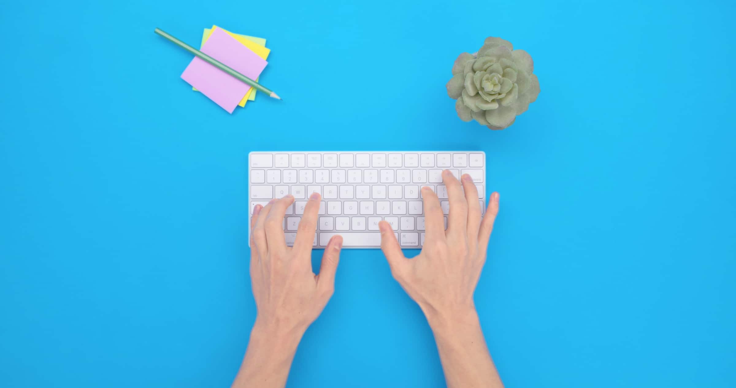 A Xero customer types on a keyboard to whip up a purchase order in no time.