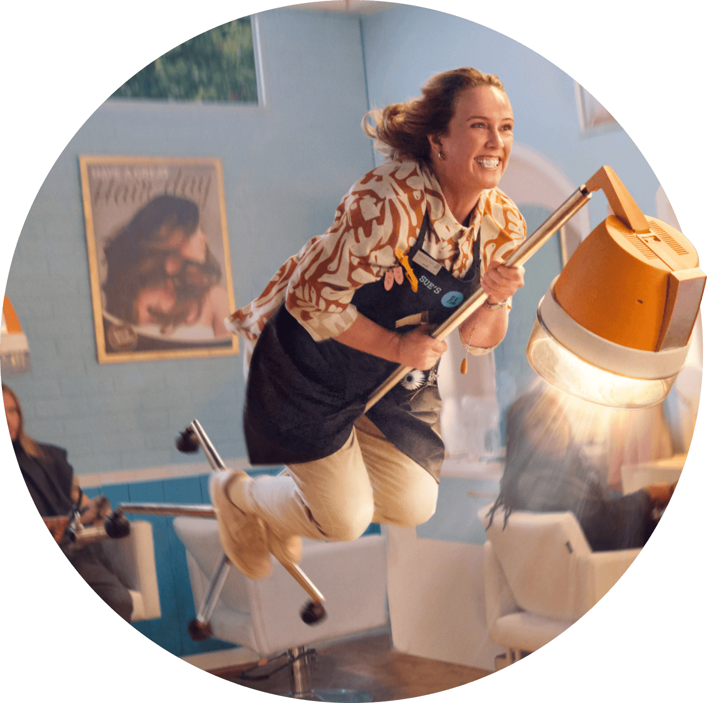 A hairdresser flies through her shop after wrapping up her financial year. 