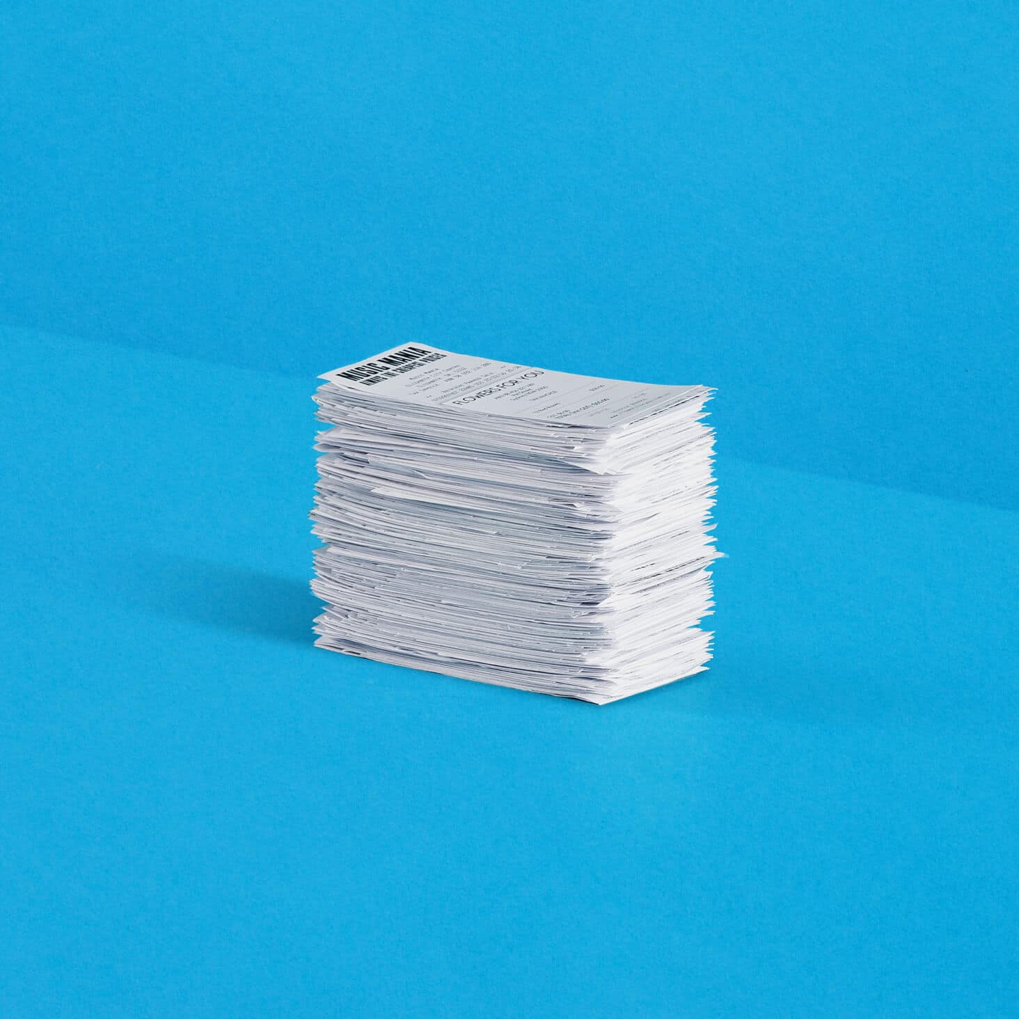 A large stack of receipts for expense claims.
